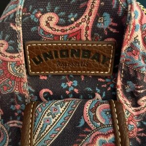 Union Bay shoulder sling backpack with lots of storage including 4 zippered